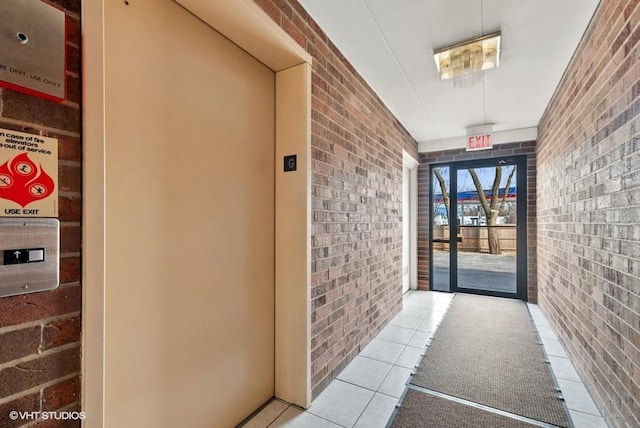 doorway to property featuring elevator