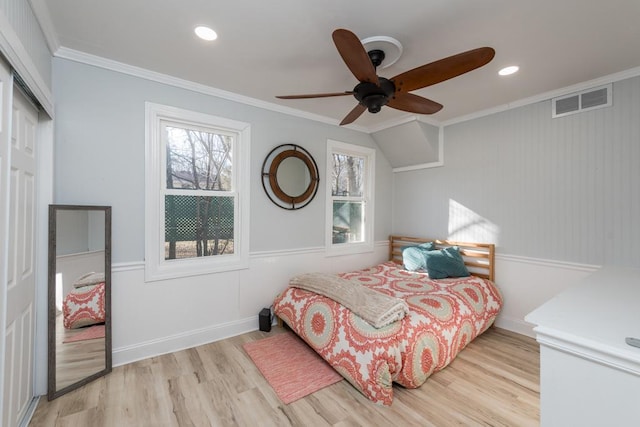 bedroom featuring recessed lighting, visible vents, wood finished floors, and crown molding