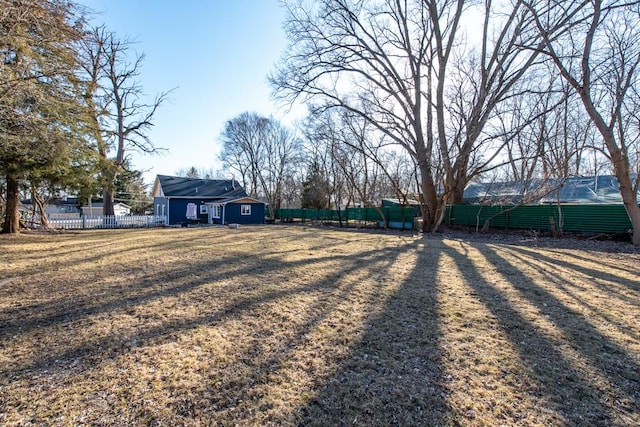 view of yard with fence