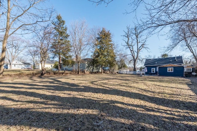 view of yard with fence