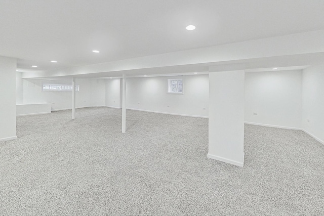 basement featuring carpet flooring, recessed lighting, and baseboards