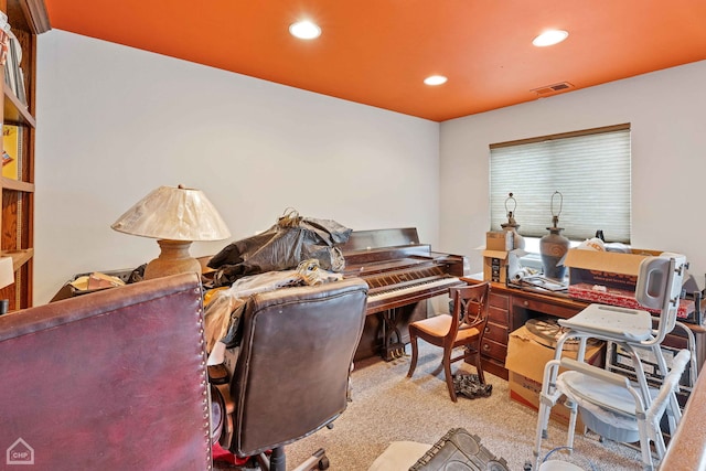 carpeted office with visible vents and recessed lighting