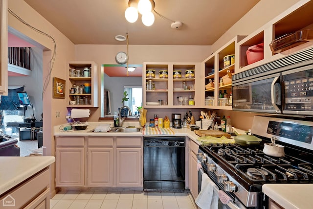 kitchen featuring open shelves, a sink, black appliances, white cabinets, and light countertops