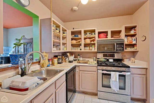 kitchen featuring a sink, black dishwasher, light countertops, light tile patterned floors, and stainless steel gas range