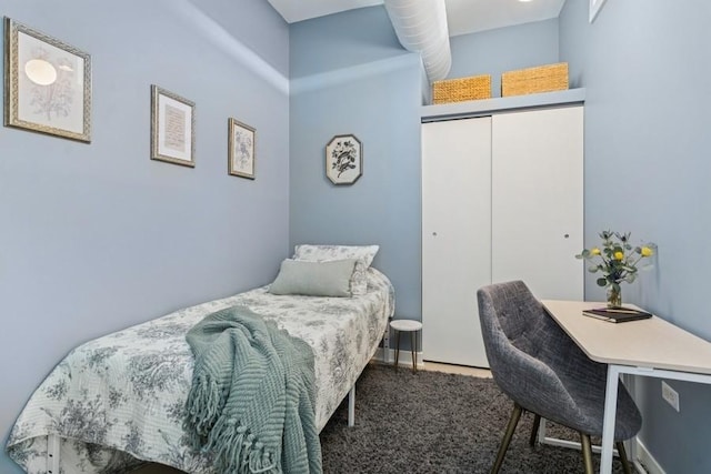 bedroom with a closet and carpet flooring