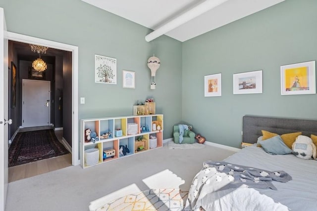 bedroom featuring beamed ceiling, baseboards, carpet floors, and an inviting chandelier