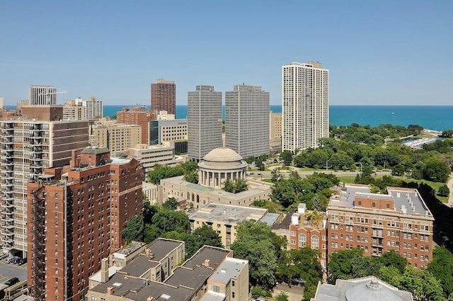 property's view of city featuring a water view