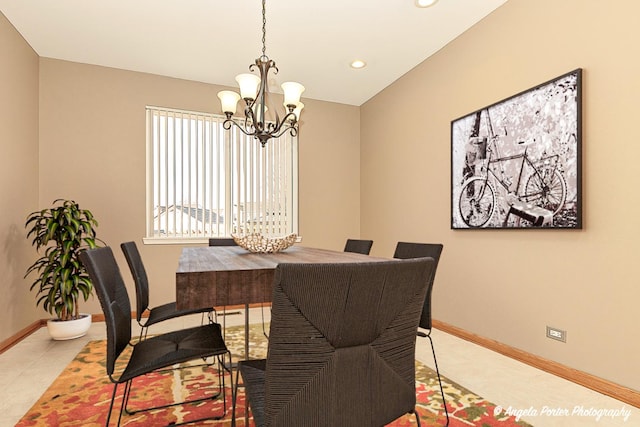 dining space with recessed lighting, baseboards, a notable chandelier, and light tile patterned flooring