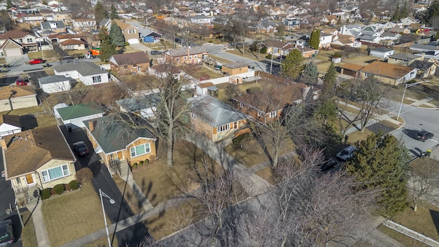 birds eye view of property with a residential view