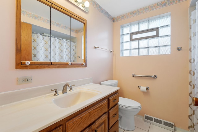 bathroom featuring vanity, a shower with curtain, visible vents, tile patterned flooring, and toilet