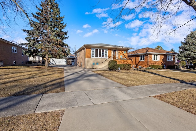 view of front of property featuring a front lawn, brick siding, driveway, and crawl space