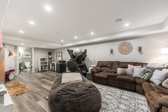 living room featuring recessed lighting and wood finished floors