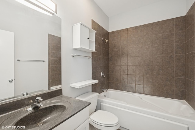 bathroom with toilet, vanity, and shower / tub combination