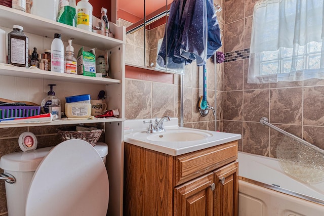 full bathroom featuring shower / bathtub combination, toilet, and vanity