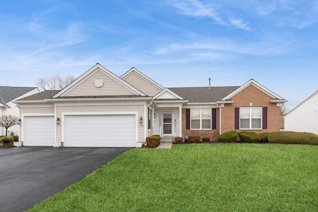 13536 Westridge Ct, Huntley, IL 60142 - ranch-style home featuring roof with shingles, brick siding, an attached garage, a front yard, and aphalt driveway