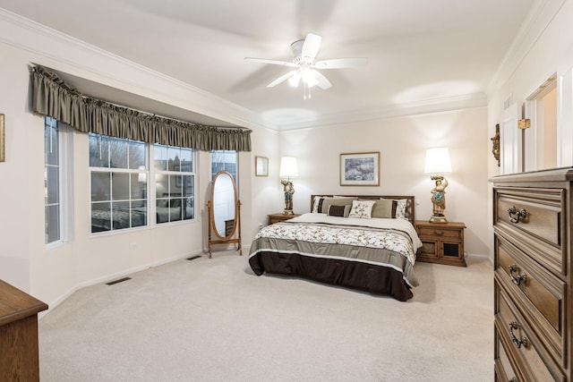 13536 Westridge Ct, Huntley, IL 60142 - carpeted bedroom with visible vents, a ceiling fan, baseboards, and ornamental molding