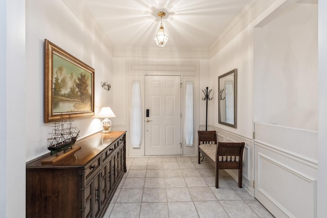 13536 Westridge Ct, Huntley, IL 60142 - entrance foyer featuring light tile patterned flooring and crown molding