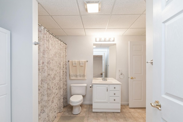 13536 Westridge Ct, Huntley, IL 60142 - bathroom with vanity, a drop ceiling, a shower with curtain, toilet, and tile patterned flooring