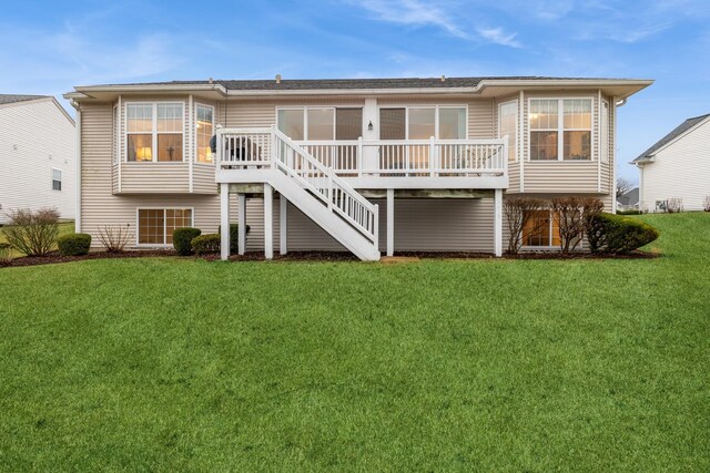 13536 Westridge Ct, Huntley, IL 60142 - back of property with a yard, stairway, and a deck