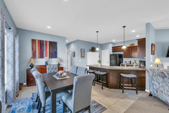 dining space featuring light tile patterned flooring, recessed lighting, and baseboards