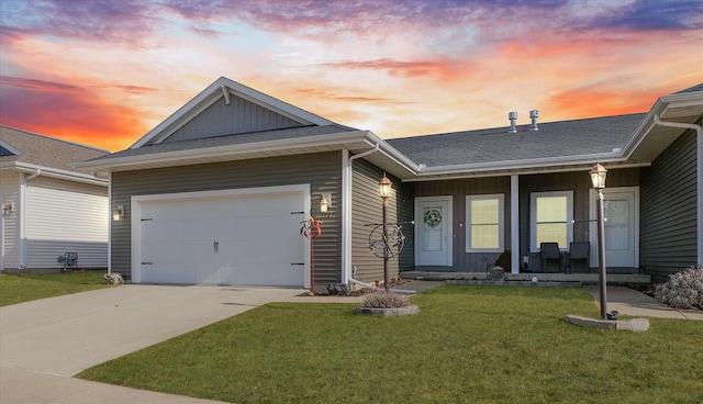 ranch-style house with a front lawn, covered porch, concrete driveway, an attached garage, and roof with shingles