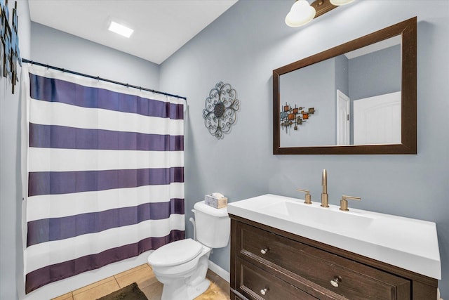 full bath featuring a shower with curtain, toilet, tile patterned flooring, baseboards, and vanity