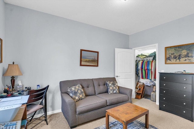 living room with baseboards and carpet