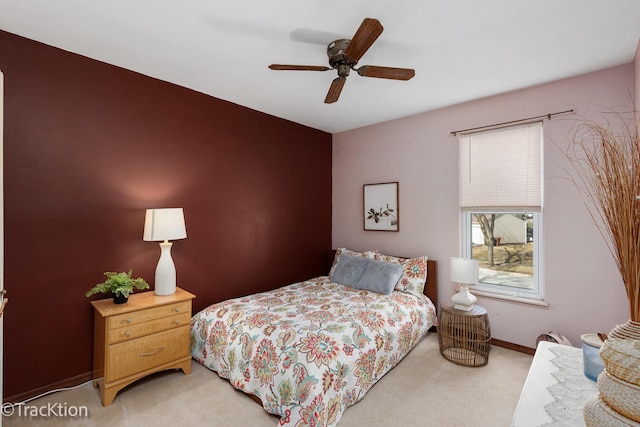 bedroom featuring baseboards, carpet floors, and ceiling fan