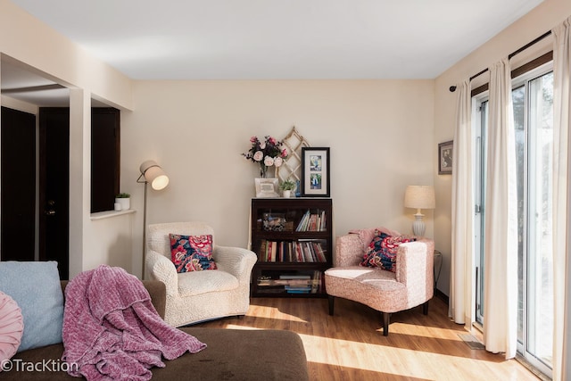 sitting room featuring wood finished floors