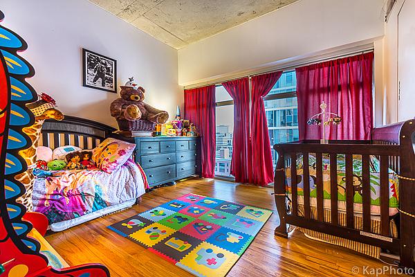 bedroom with wood finished floors