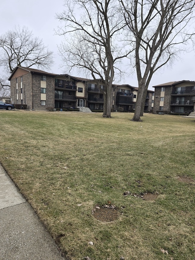 surrounding community featuring a lawn