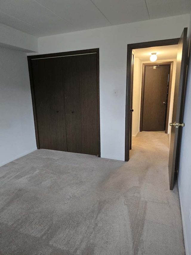 unfurnished bedroom featuring carpet