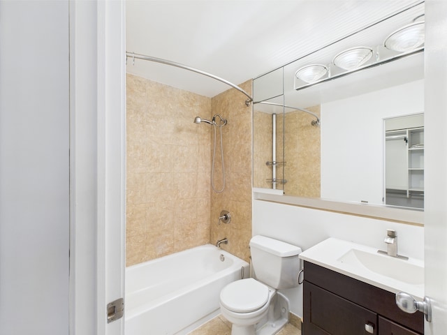 bathroom with vanity, bathing tub / shower combination, and toilet