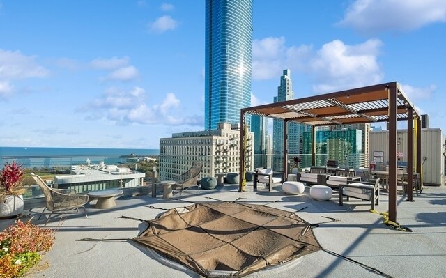 40 E 9th St Unit 609, Chicago, IL 60605 - view of patio with a water view