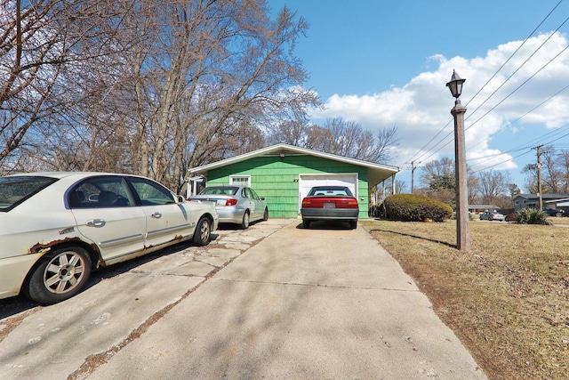 view of property exterior featuring driveway