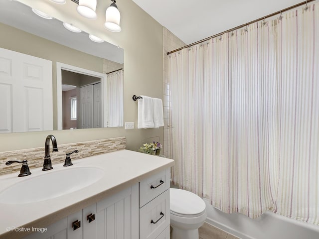 full bath with backsplash, toilet, vanity, and shower / bath combination with curtain