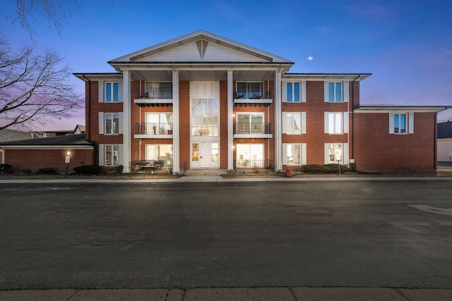 view of property at dusk