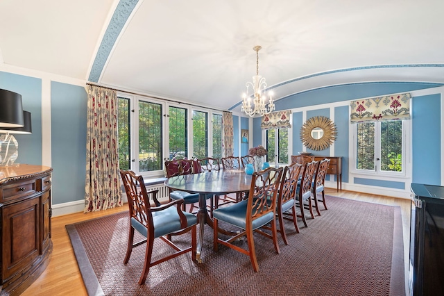 2855 Sheridan Pl, Evanston, IL 60201 - dining space featuring a chandelier, light wood-style floors, and lofted ceiling