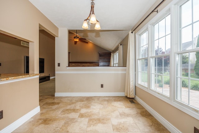 1208 Broad Creek Rd, Bloomington, IL 61704 - unfurnished dining area with healthy amount of natural light, baseboards, a chandelier, and vaulted ceiling