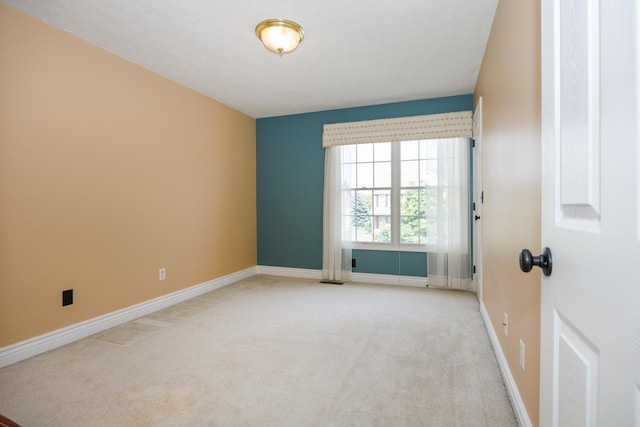 1208 Broad Creek Rd, Bloomington, IL 61704 - empty room featuring light colored carpet and baseboards