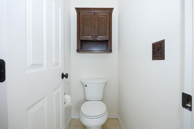 1208 Broad Creek Rd, Bloomington, IL 61704 - bathroom featuring baseboards and toilet