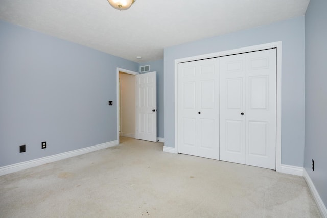 1208 Broad Creek Rd, Bloomington, IL 61704 - unfurnished bedroom with carpet floors, a closet, and baseboards