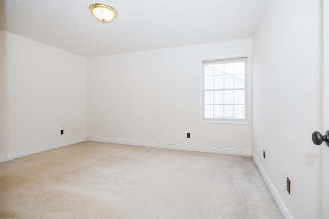 1208 Broad Creek Rd, Bloomington, IL 61704 - empty room with light colored carpet and baseboards