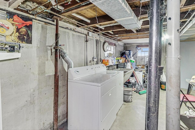 laundry area with laundry area and separate washer and dryer