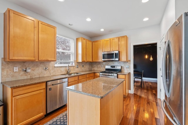 2668 Bull Run Dr, Aurora, IL 60503 - kitchen featuring light stone countertops, stainless steel appliances, wood-type flooring, and a sink