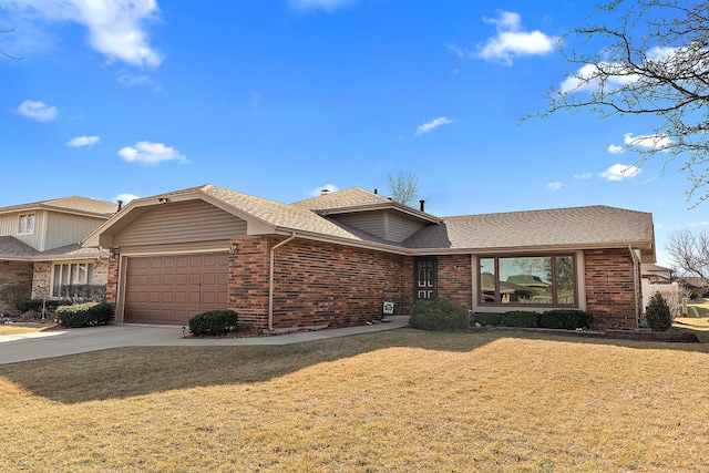 ranch-style home featuring concrete driveway, a front yard, a shingled roof, a garage, and brick siding