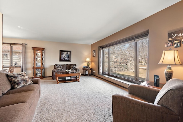 living area featuring carpet