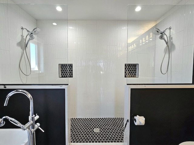 bathroom with recessed lighting and a walk in shower