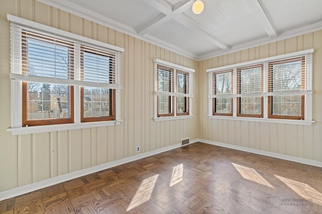 unfurnished sunroom with beamed ceiling, coffered ceiling, and visible vents