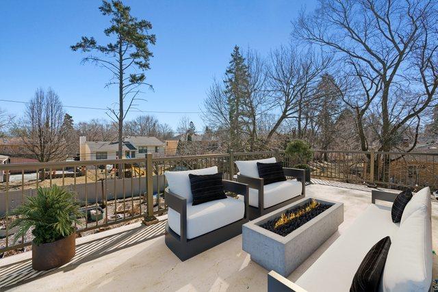 view of patio / terrace featuring an outdoor living space with a fire pit